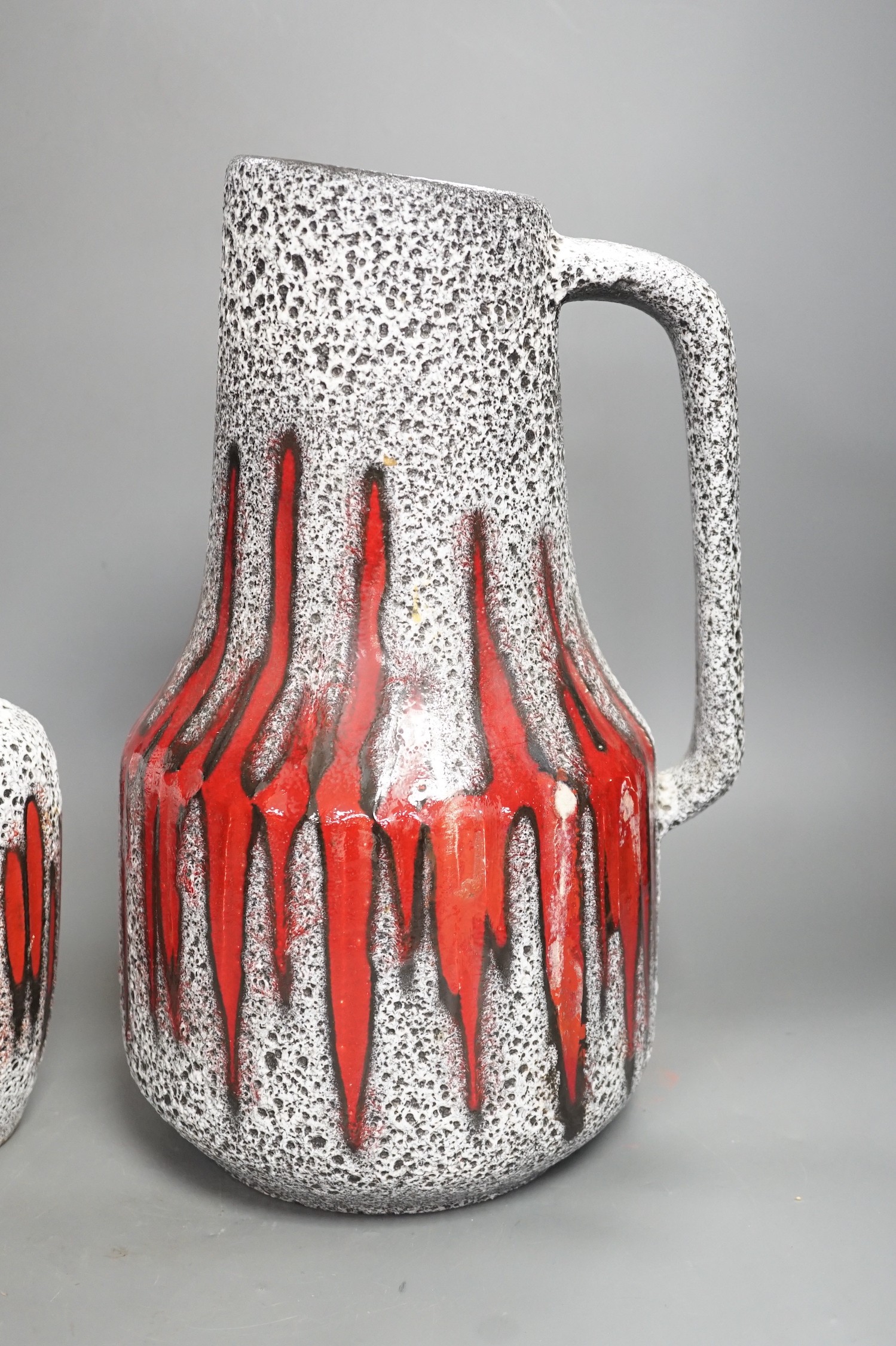 A Scheurich West German volcanic-glaze ewer and matching vase, Tallest 39 cm